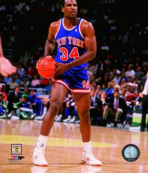 Charles Oakley of the New York Knicks looks on during a NBA